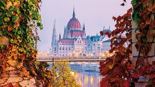 A view across the Danube River towards the Parliament Building in Budapest, Hungary